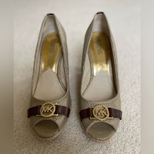 Michael Kors, women’s size 10m wedge sandal. Gold hardware.